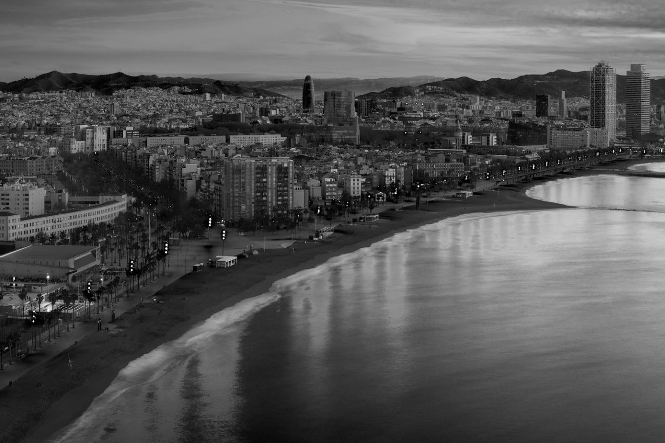Barcelona beach on morning sunrise with Barcelobna city and sea from the roof top of Hotel, Spain
